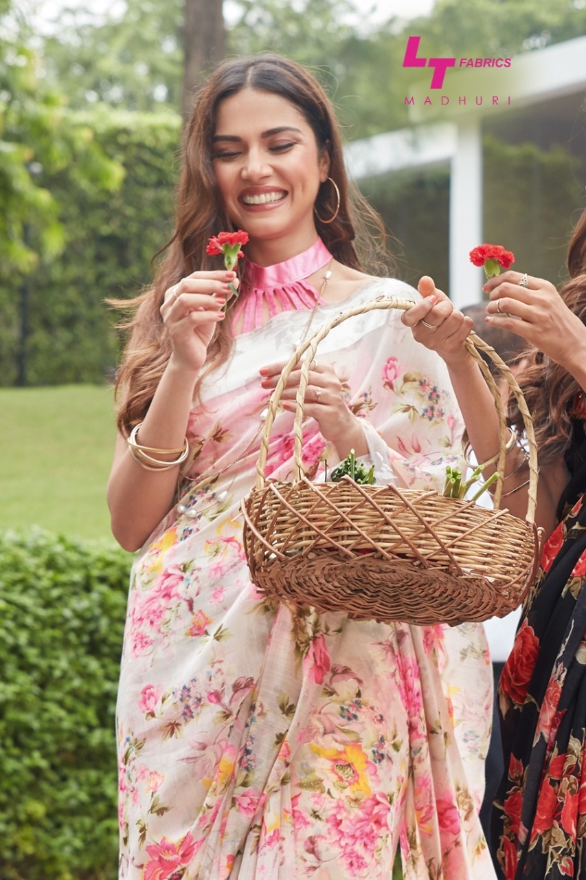Lt Fabrics Madhuri Designer Floral Printed Soft Linen Sarees...
