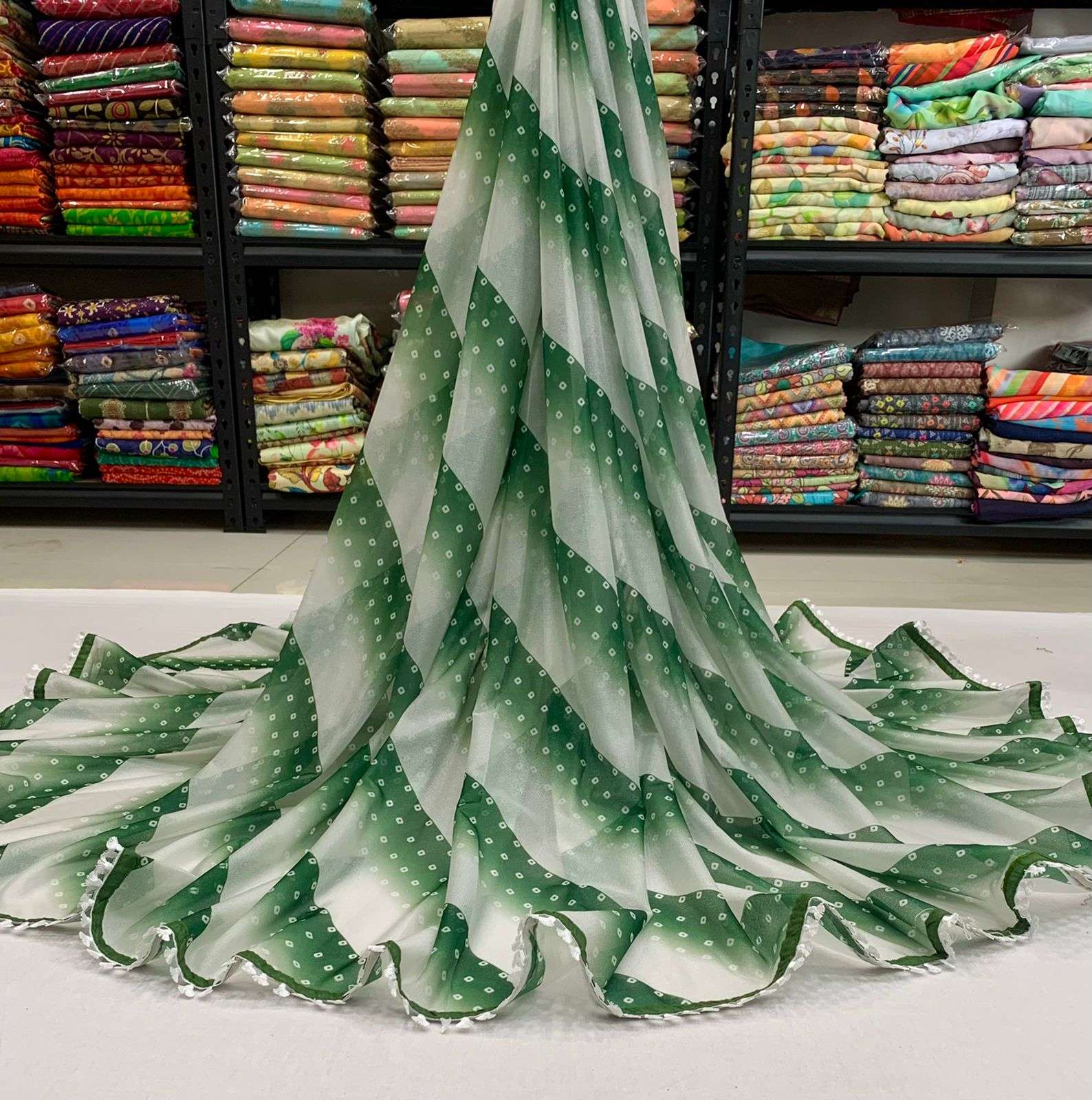 Rim Jim fabric With Laheriya Print Regular Wear Saree collec...