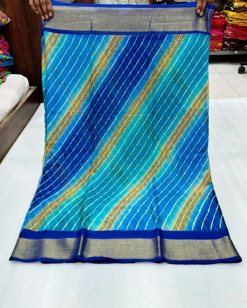 Chiffon with Laheriya Print Regular Wear Saree collection at...