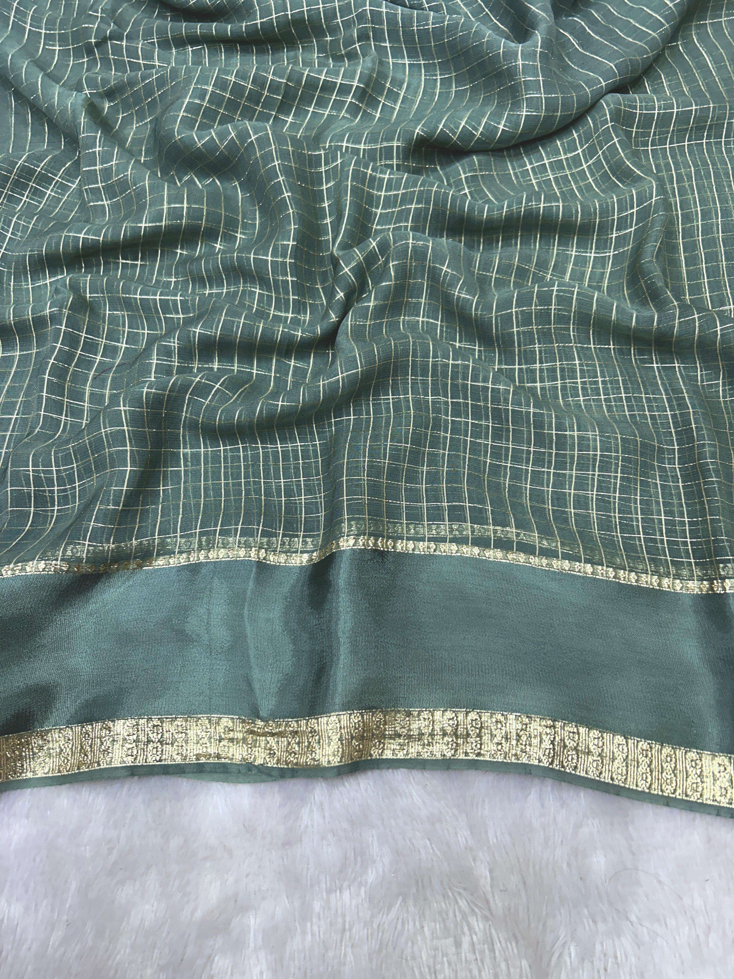 Experience the elegance of pure viscose georgette with intri...