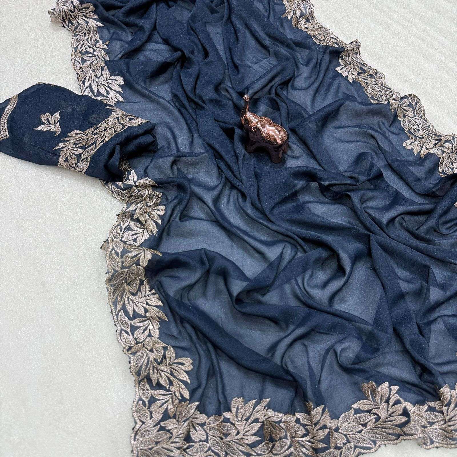 New Arrivals Star color Georgette fabric with c pallu embroi...
