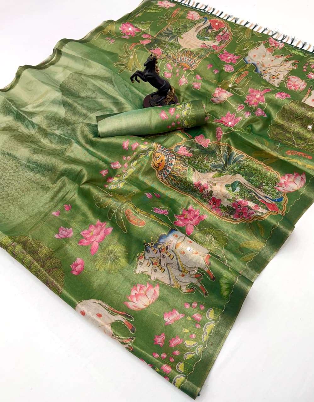  This tissue silk fabric has a soft shine and light feel It ...