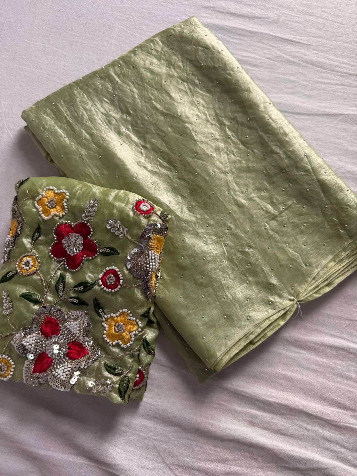 Fancy Satin radiant fabric Dual Shaded with beautifully stit...