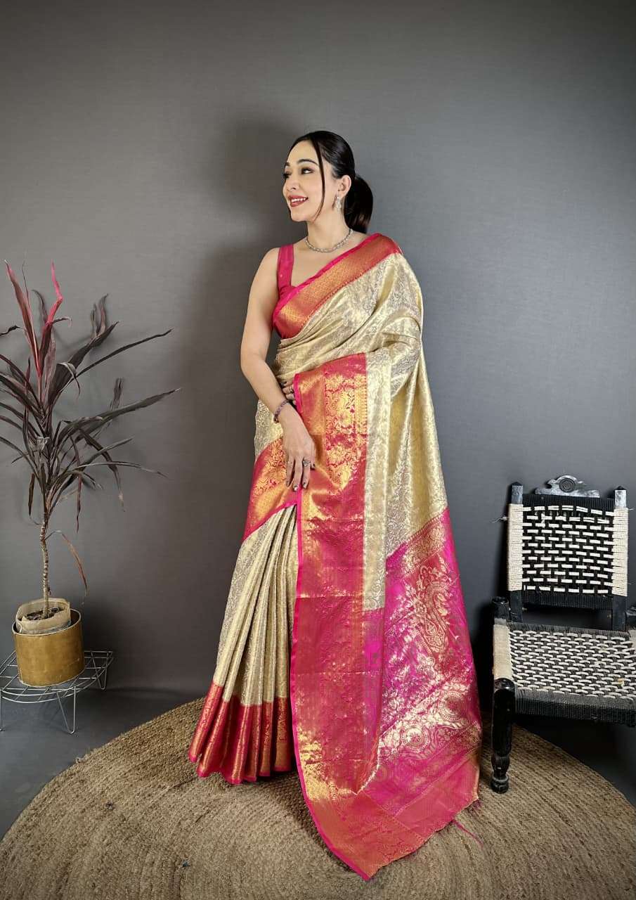 Kanchipuram Silk fabric features a rich gold base with beaut...