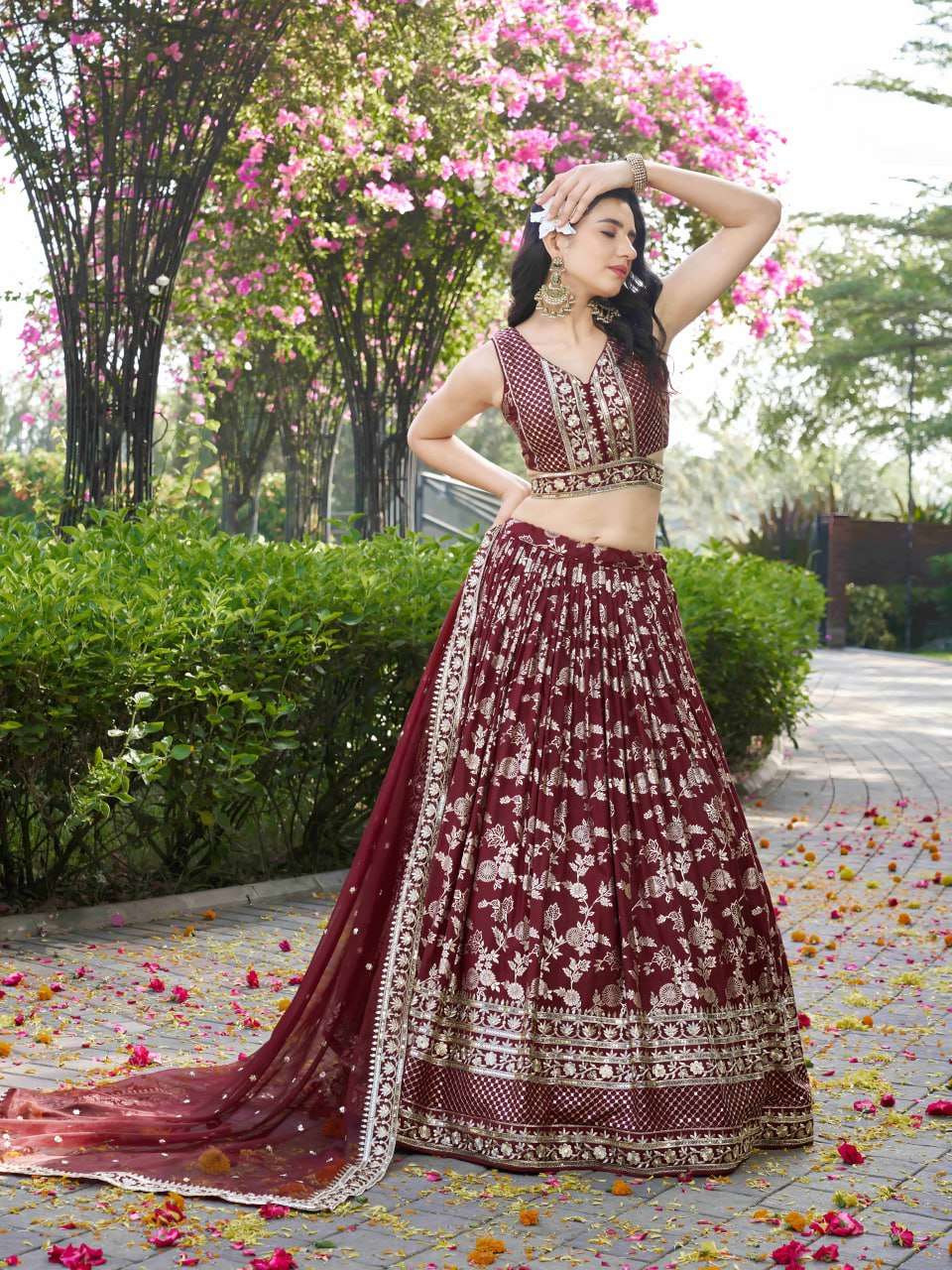   Luxurious Maroon is crafted from rich dola silk jacquard ...