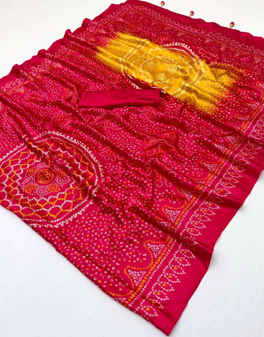 Premium and iconic Ajrakh Luxe Bandhni semi modal fabric san...
