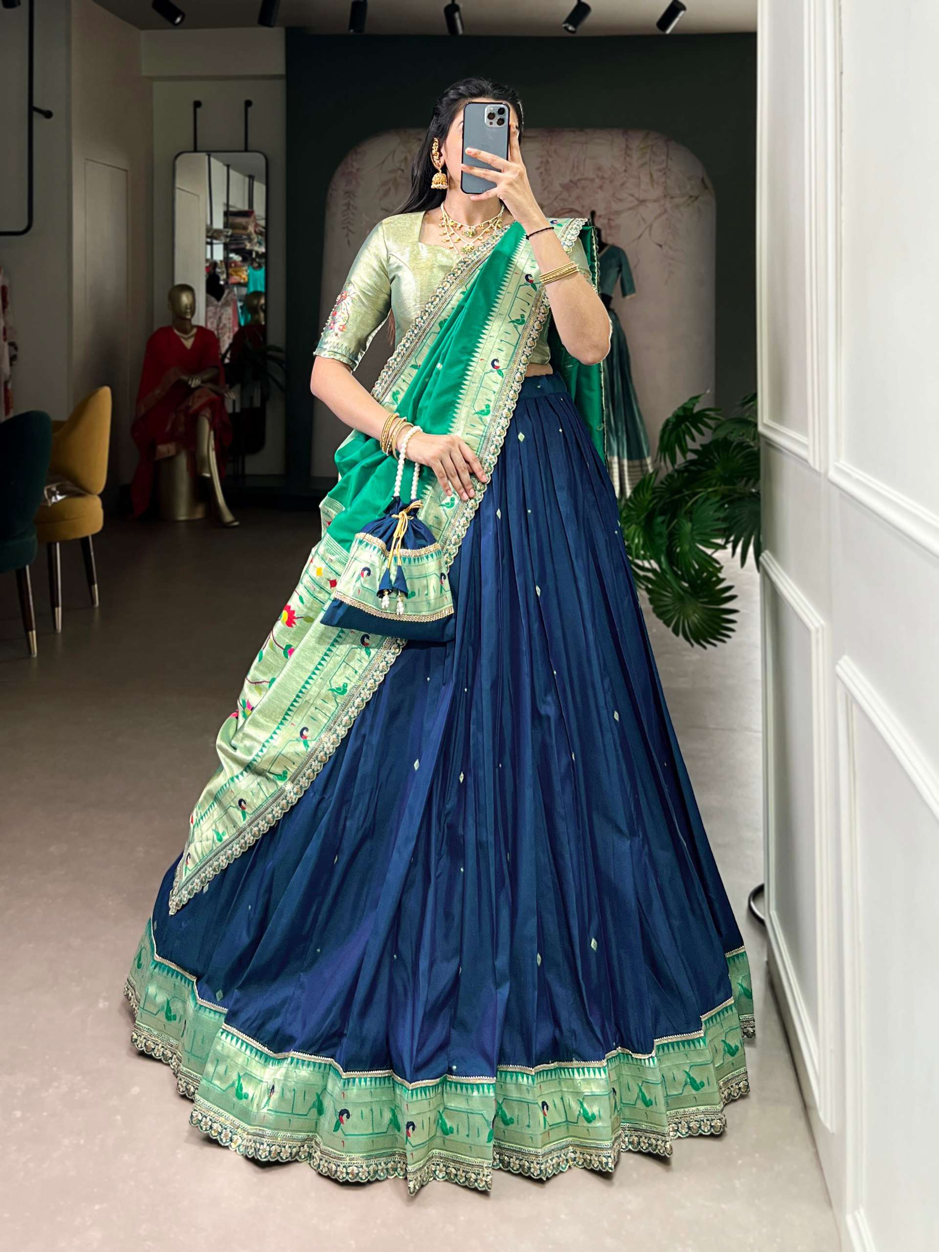 machura Draped in refreshing shades of green this soft silk...