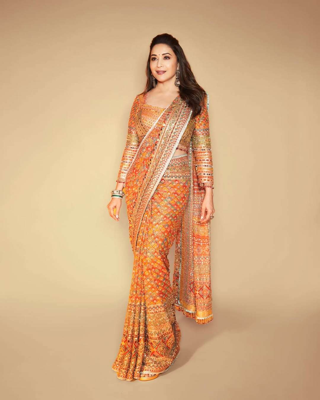 MADHURI HEAVY AND VERSATILE CREAP FANCY FABRIC BLOOMING REGU...