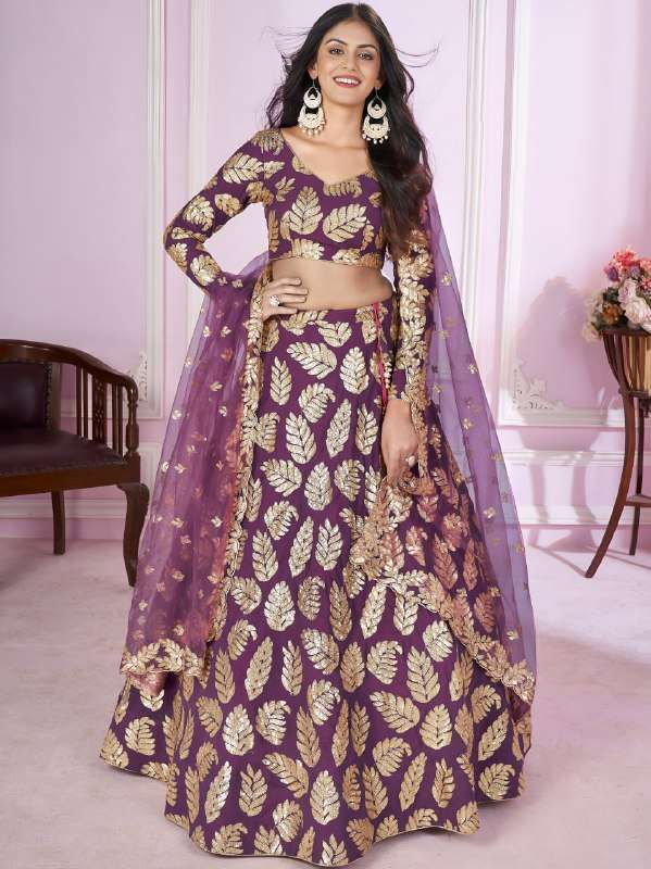 This purple lehenga choli Georgette fabric showcases eye cat...