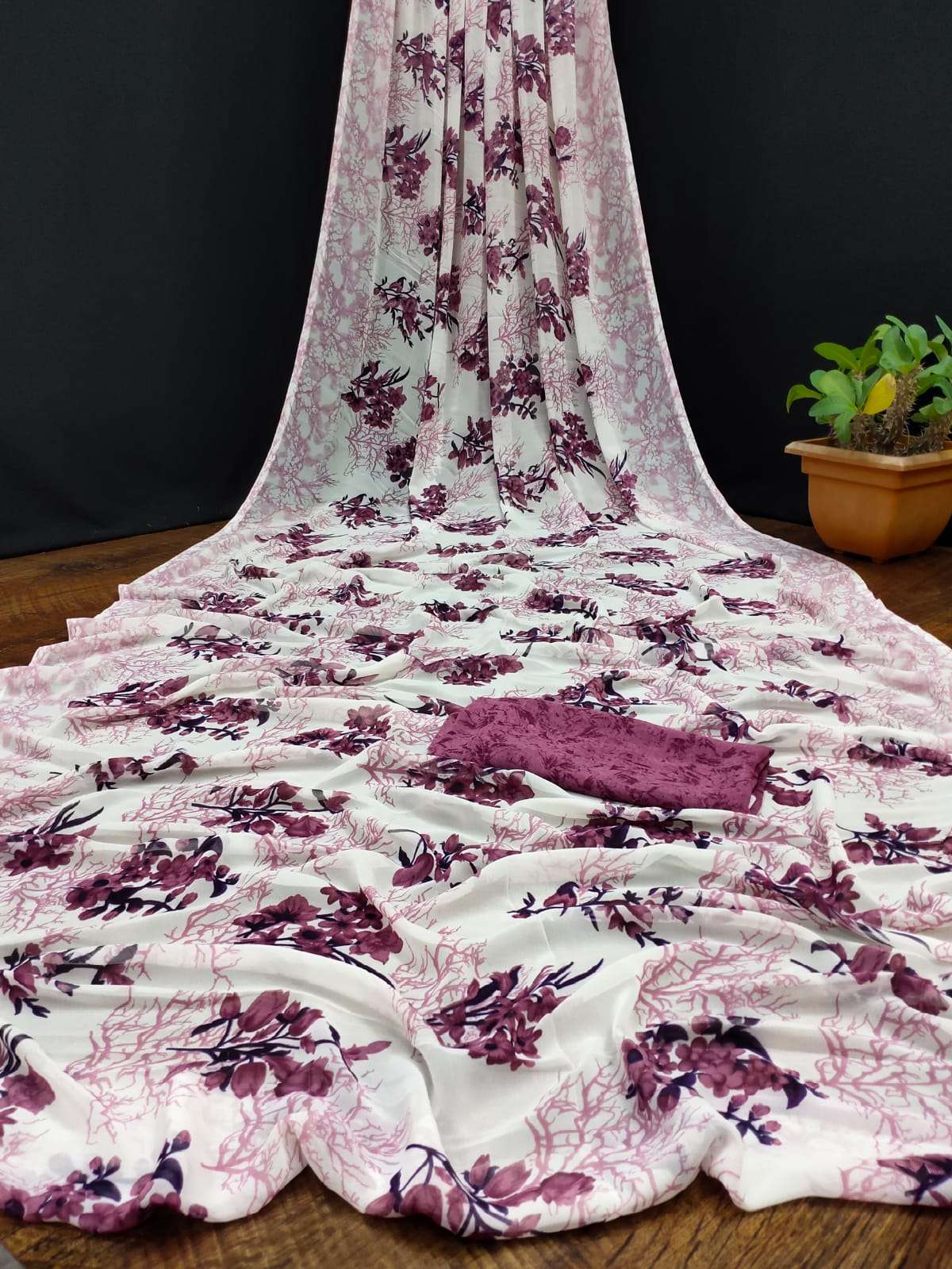 Weightless and soft with lots of floral digital print on sar...