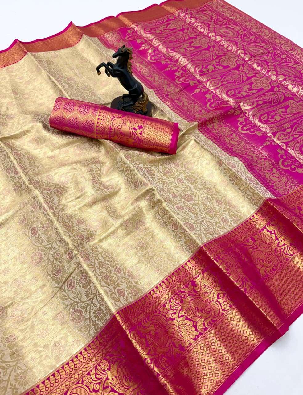 Kanchipuram Silk fancy fabric with features a rich gold base...