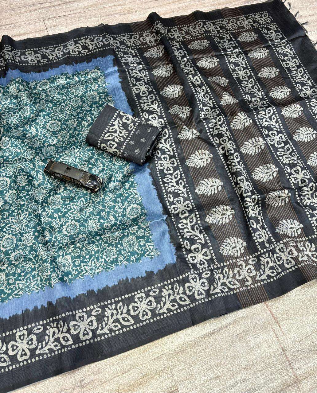 Presents Black Suffi Silk fancy fabric with Unique Print Sar...
