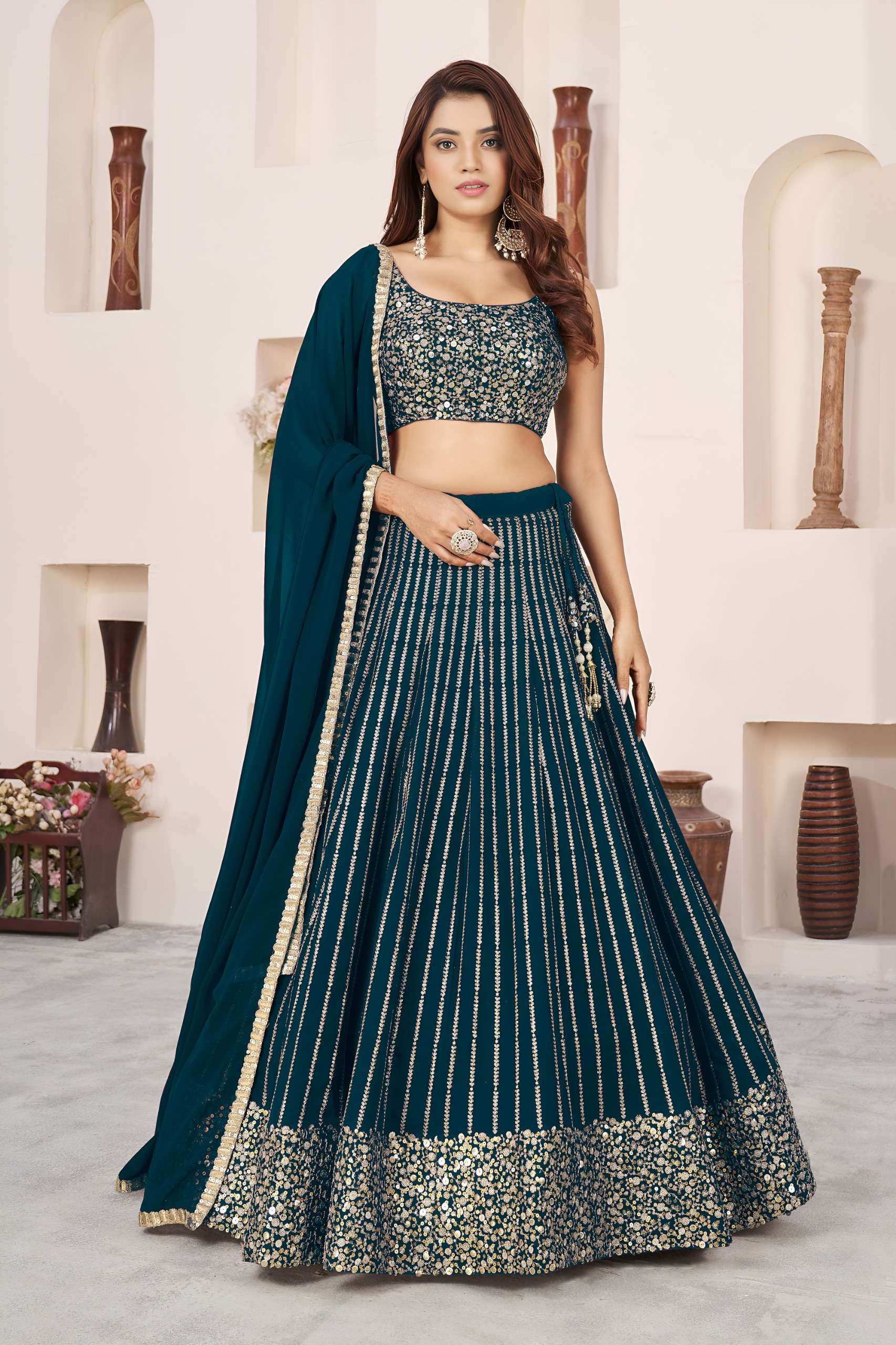 beautiful and elegant Teal Green colour Georgette fabric Leh...