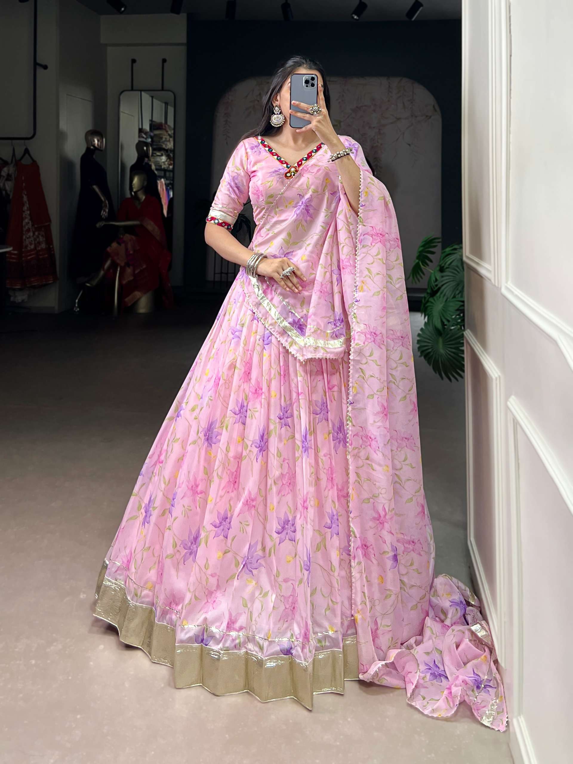 Drape yourself in the beauty of tradition with a floral Tabb...