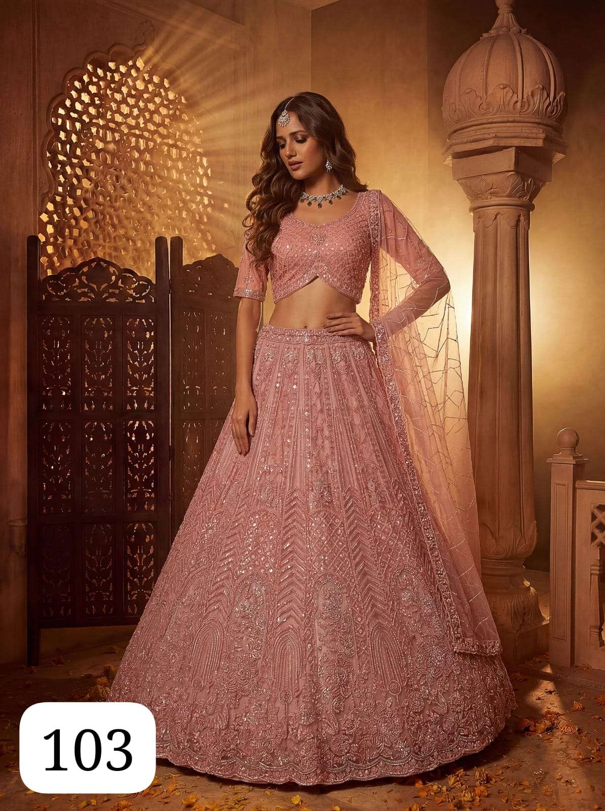 PC DAMLA BEAUTIFUL AND FANCY NET FABRIC PARTY WEAR LEHENGA C...