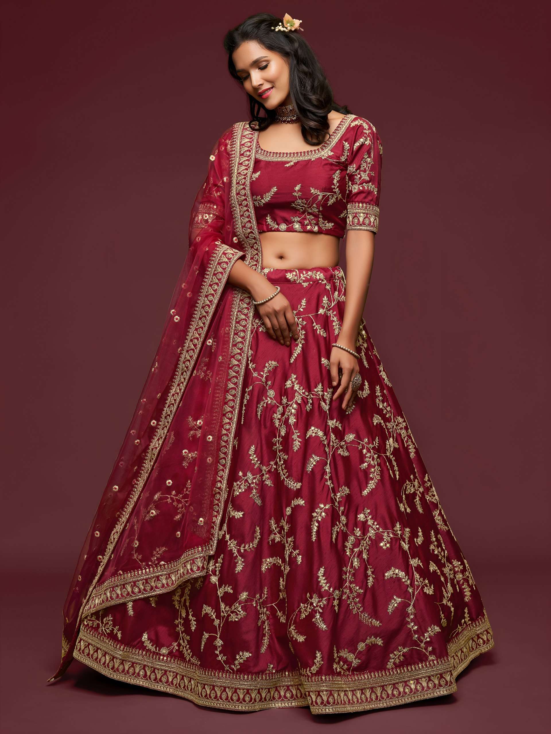 Rich and elegant Maroon colour with luxurious floral Embroid...