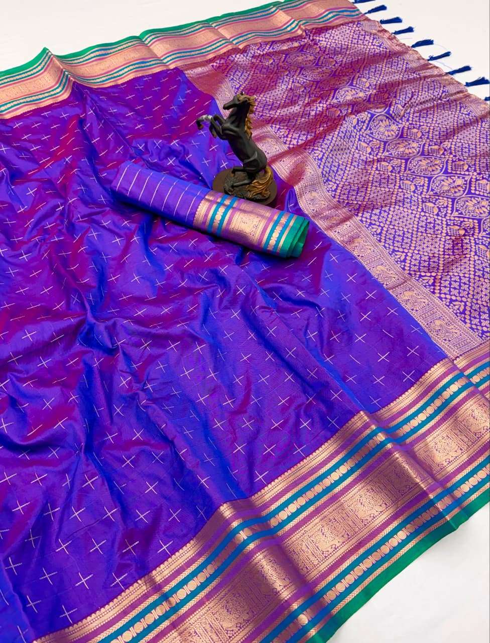  Suhasini Vol 2 This silk fancy fabric Saree gives a mesmeri...