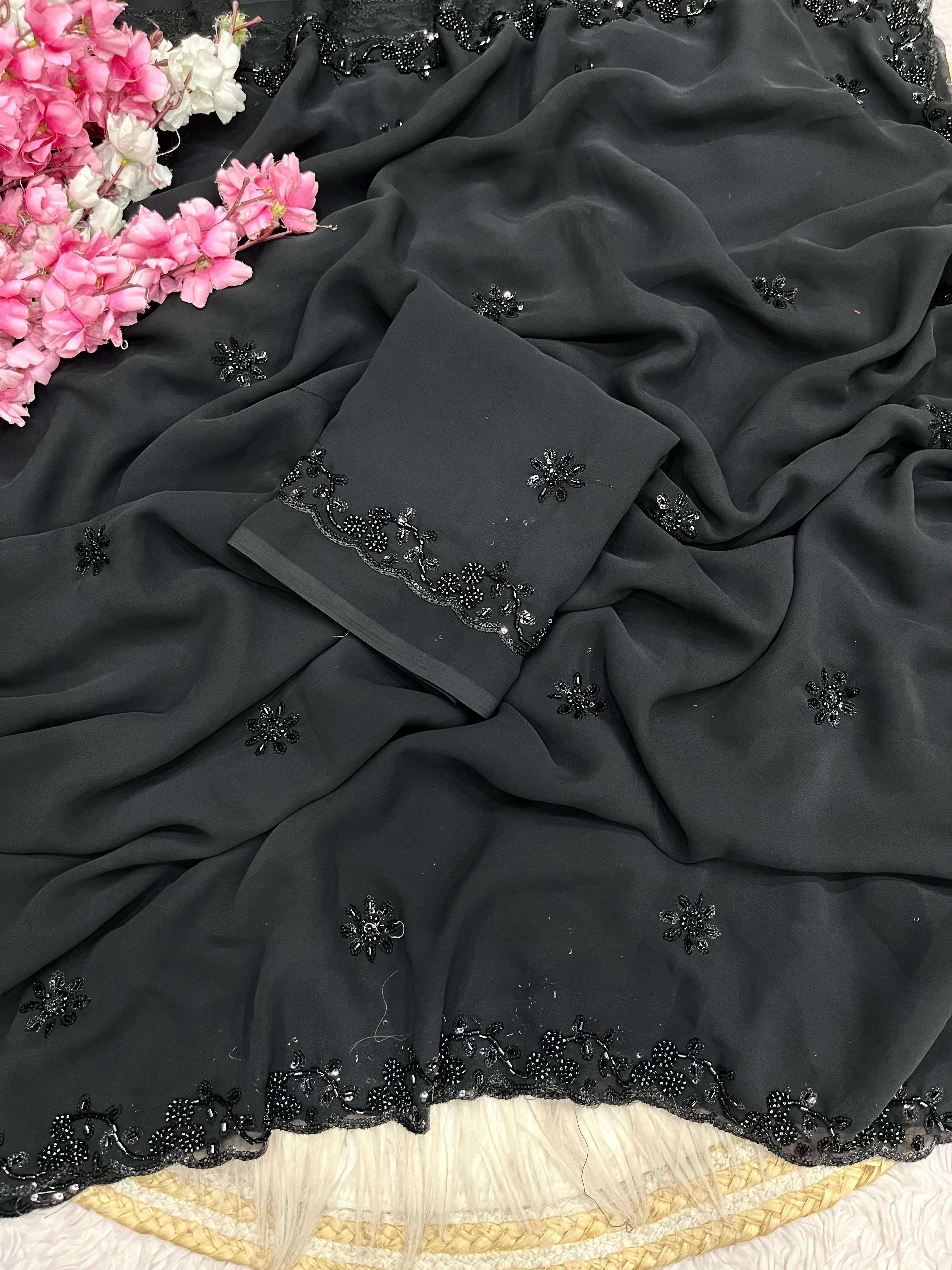 Trending black colour georgette fancy and designer fabric sa...