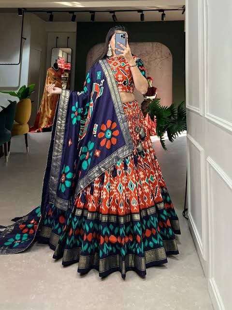 A masterpiece of craftsmanship and style printed silk lehenga choli Wholesale in surat nita