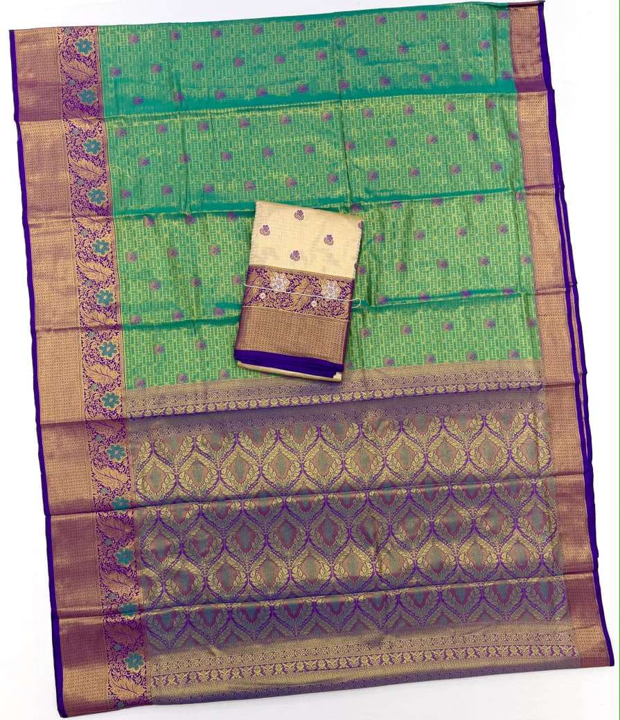 Beautiful cream And gold colour soft Kanjivaram silk fabric wedding wear saree wholesale in surat dadi