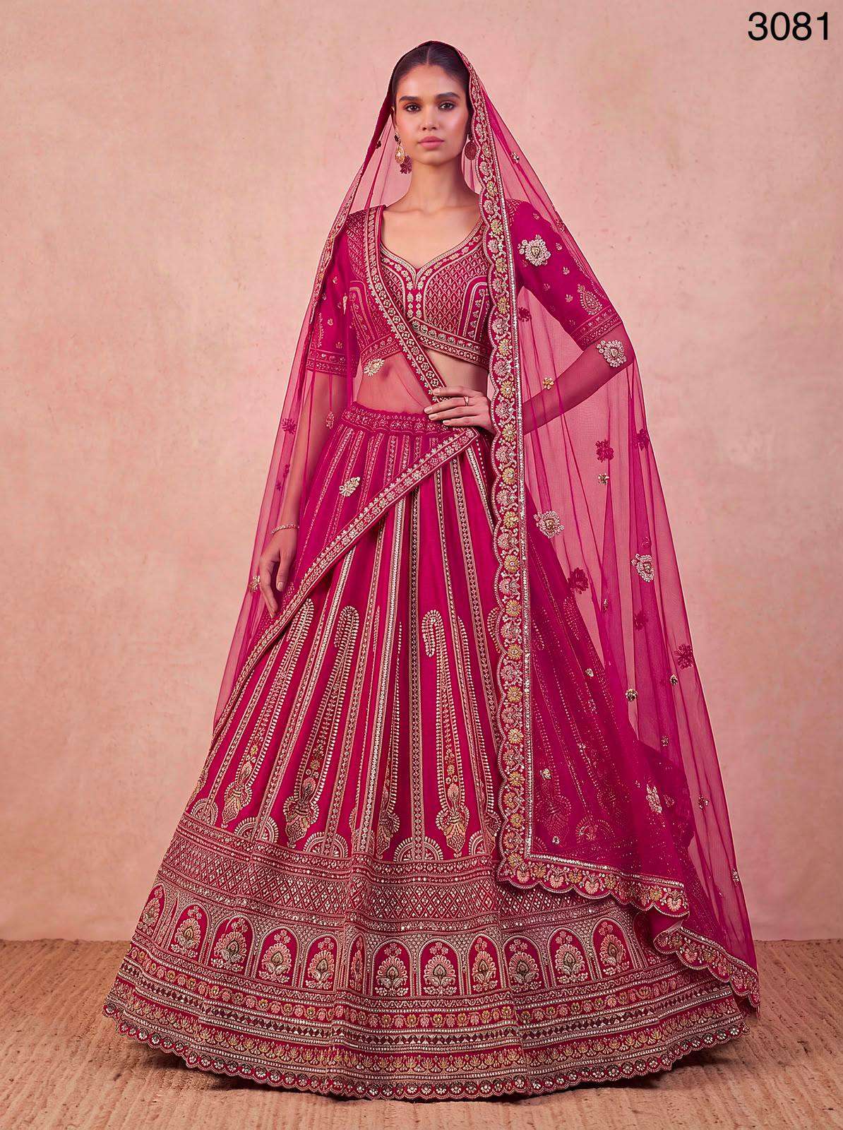 Crafted Pink colour Bridal style Premium and classic Silk fabric Lehenga Choli Wholesale in surat 3081