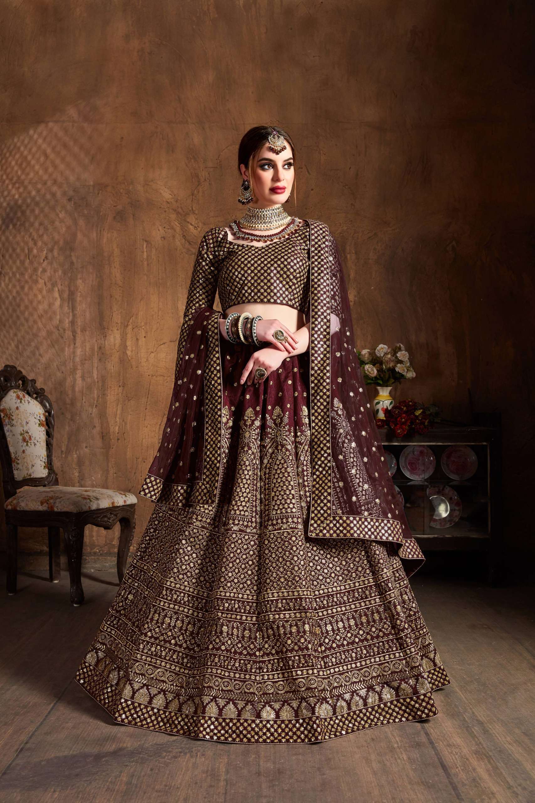 Elegant and Regal Maroon And Gold colour Raw Silk fabric lehenga choli wholesale in surat 7409 Maroon