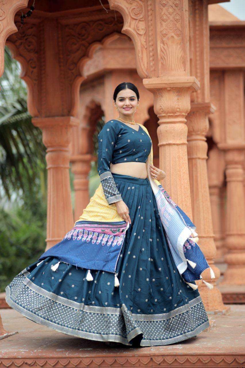 NAVRATRI COLLECTIONS SUPER SOFT MAYRA SILK FANCY FABRIC LEHENGA CHOLI WHOLESALE IN SURAT 7058 TRQS