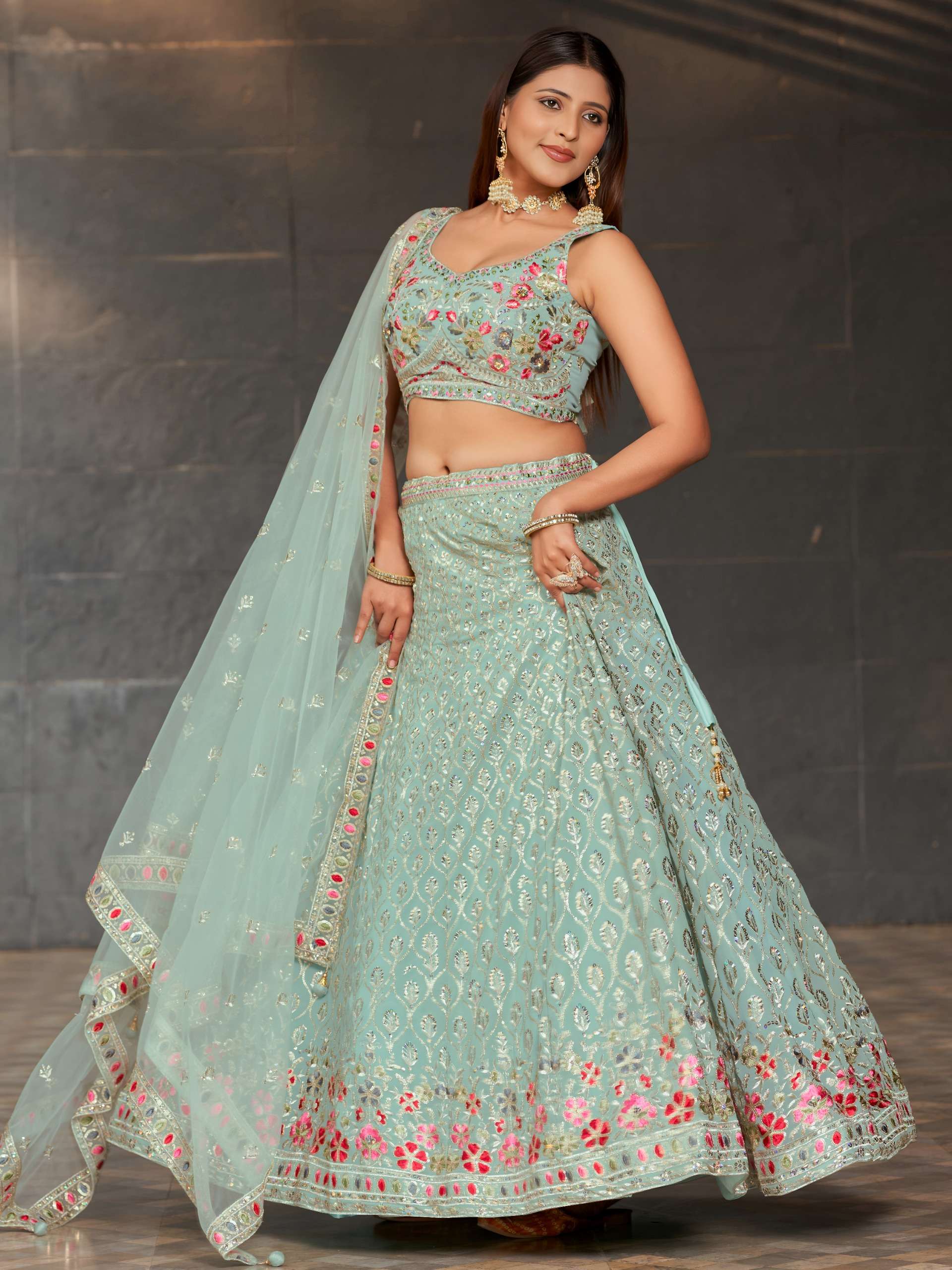 Aqua Blossom colour georgette fabric lehenga is beautifully embellished for womans reseller in surat 8002 SKY BLUE