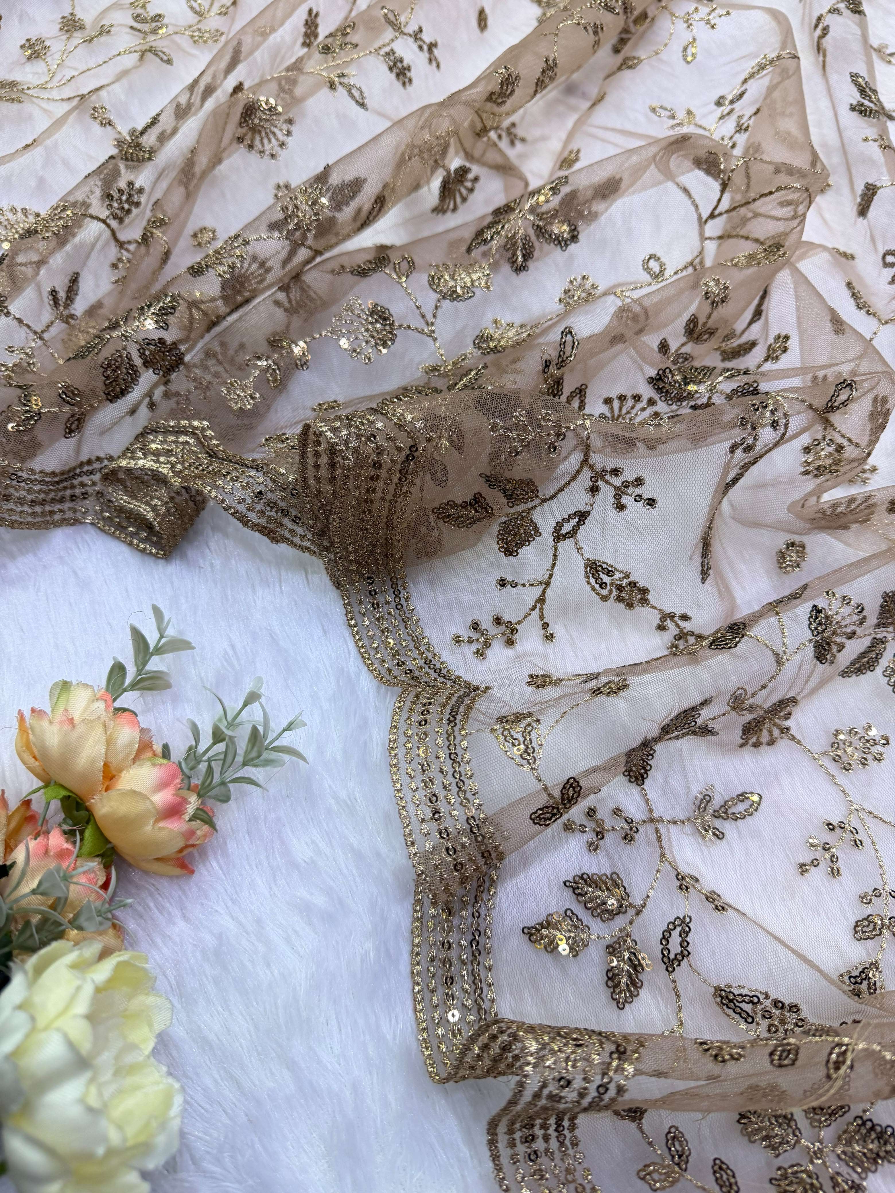  PARTY WEAR SOFT NET FANCY AND GOLDEN FABRIC SAREE WHOLESALE IN SURAT 5634
