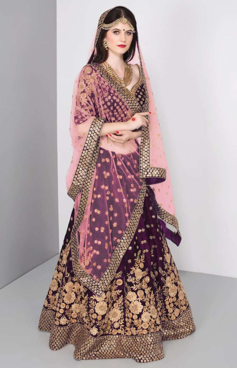 Royal and and beautiful Purple colour made of Velvet fabric Bridal wear Lehenga choli at the best rate 7024 Purple