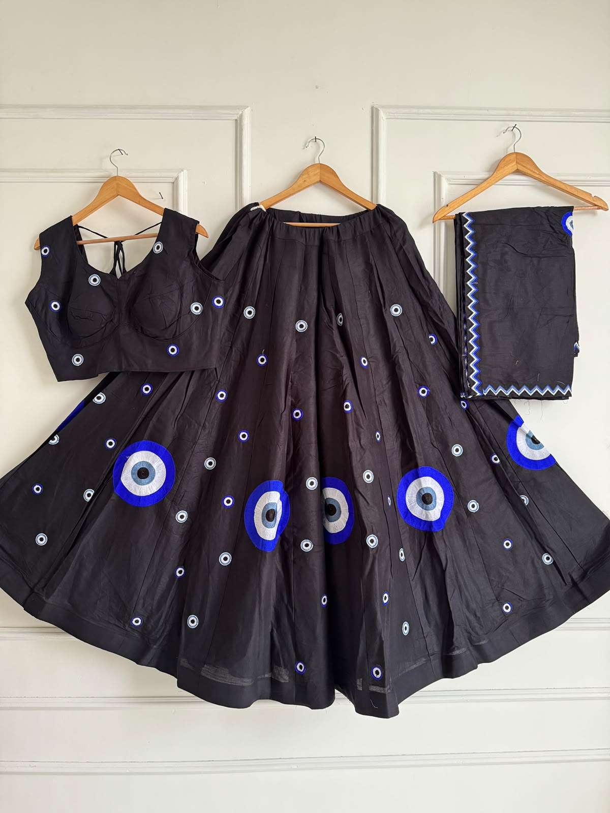 Surkhi Heavy Cotton silk fancy fabric with evil eye print on Chaniya Choli wholesale in surat