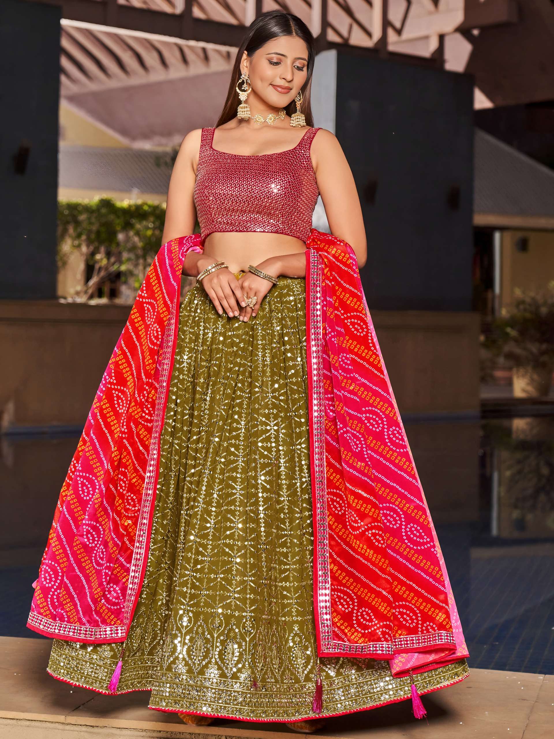 The olive green colour georgette fabric lehenga is beautifully embellished for you reseller in surat 8004 Olive