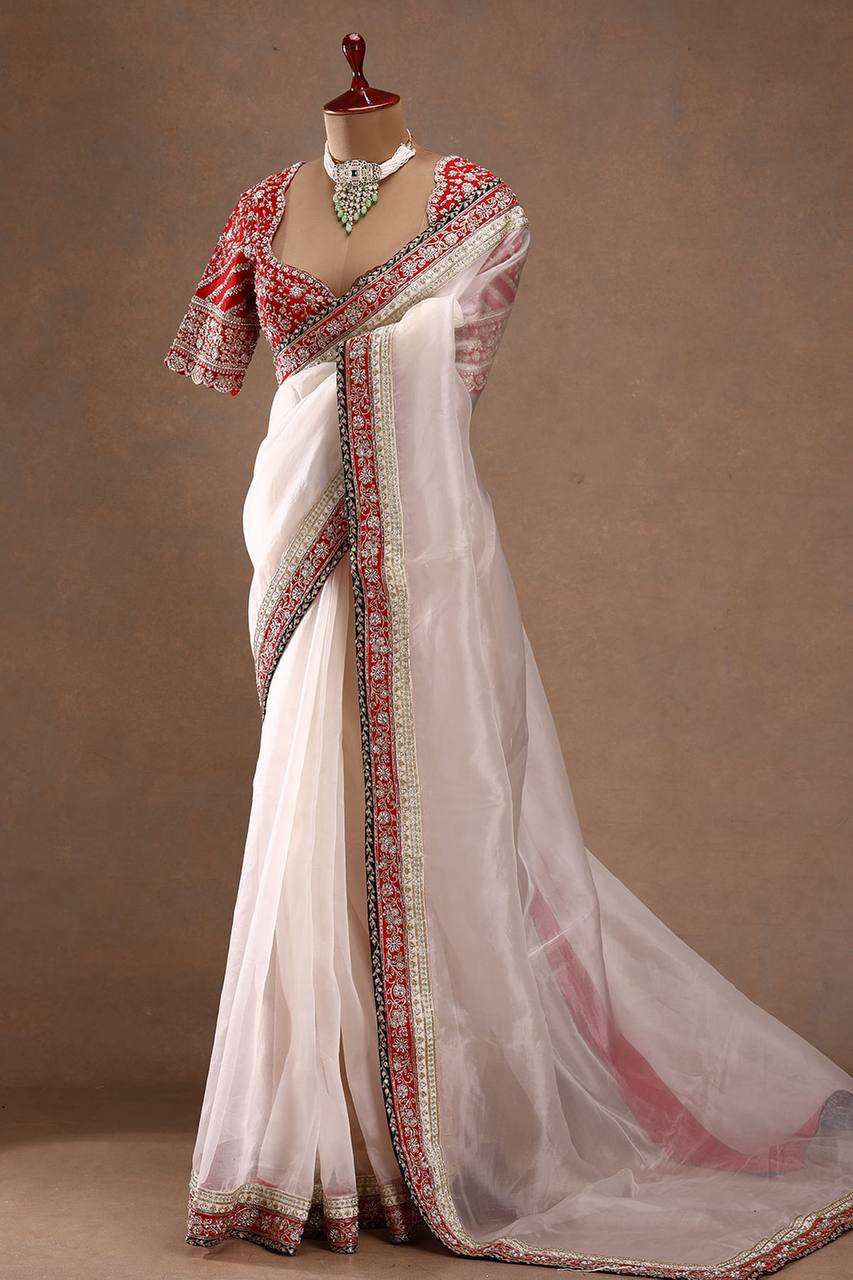 White colour beautiful saree made of Space Silk fancy fabric saree wholesale in surat 5529
