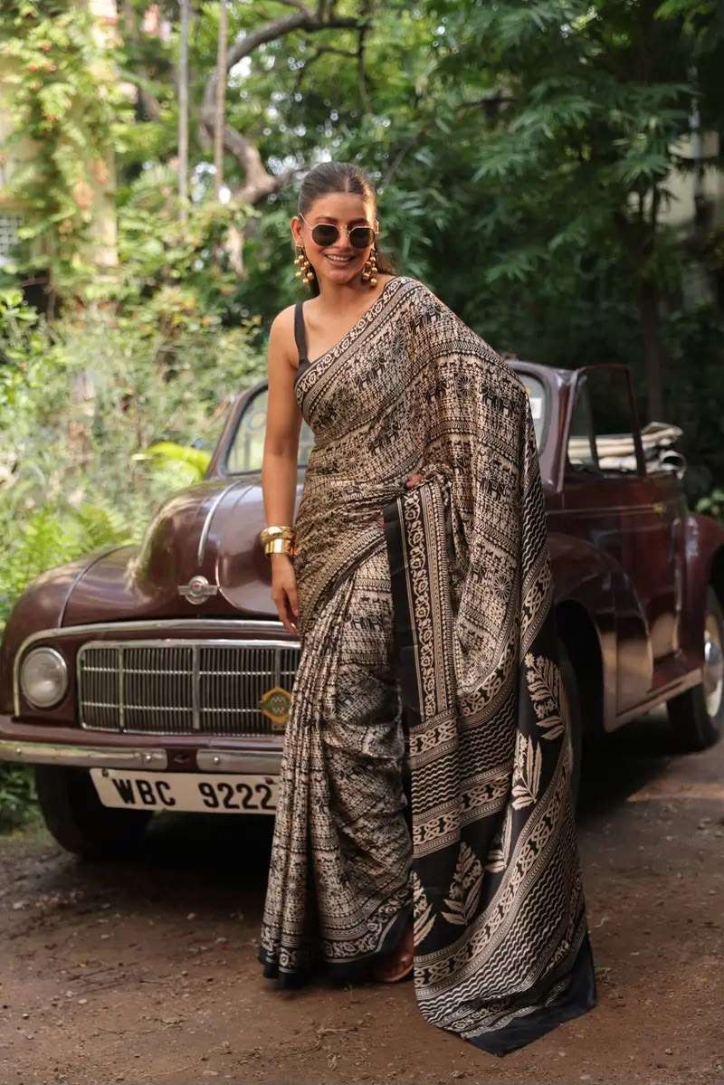 Classy floral designer Modal silk fancy fabric saree wholesale in surat