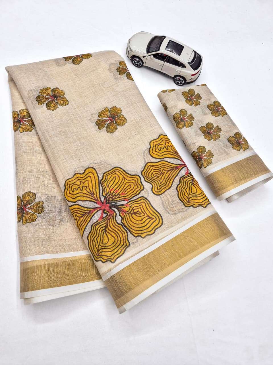  Diwali Festival Special Kerala Saree Chiku Linen fancy fabric saree wholesale in surat