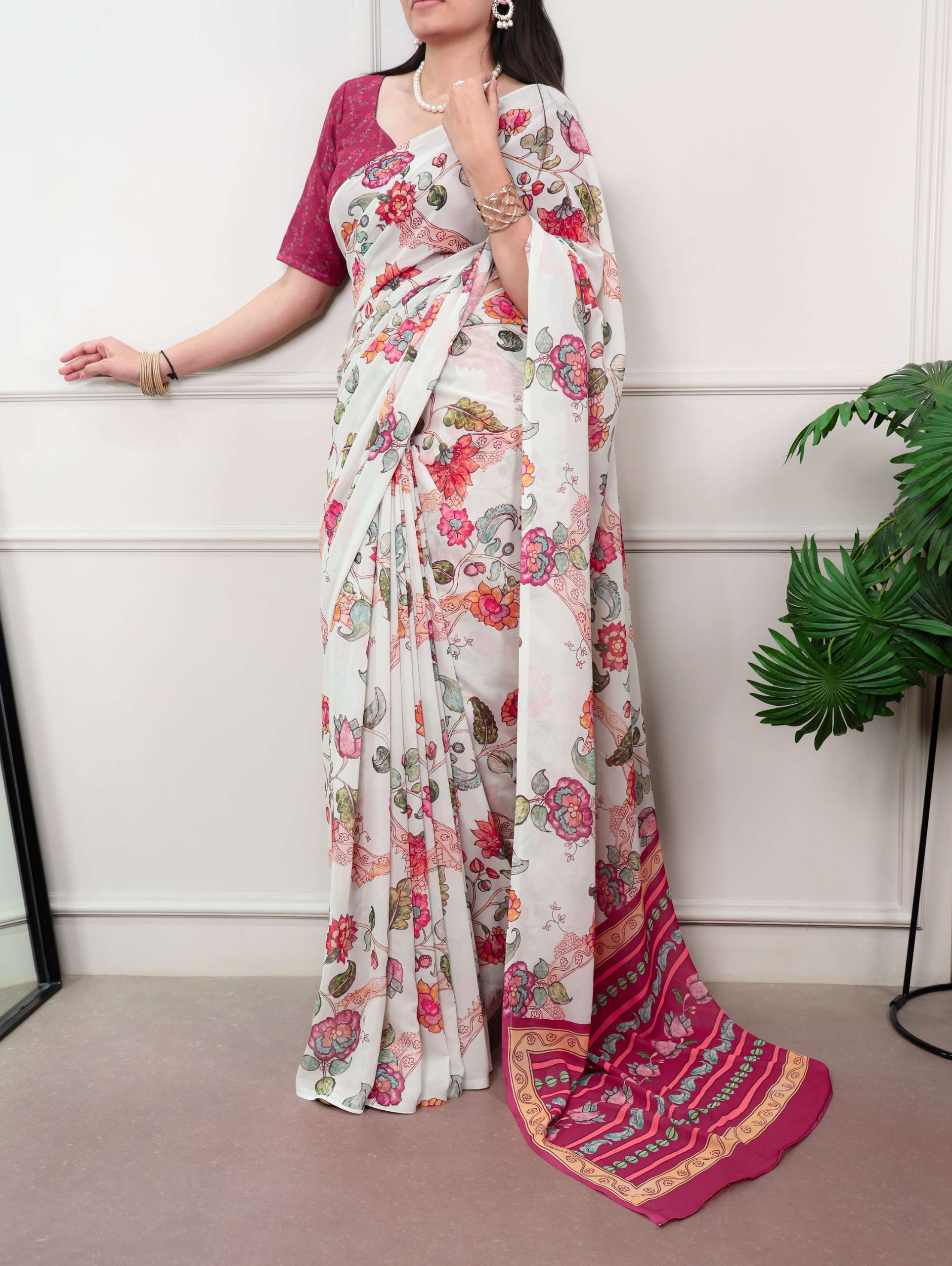 floral charm White colour fancy Georgette fabric Saree reseller in surat 7061