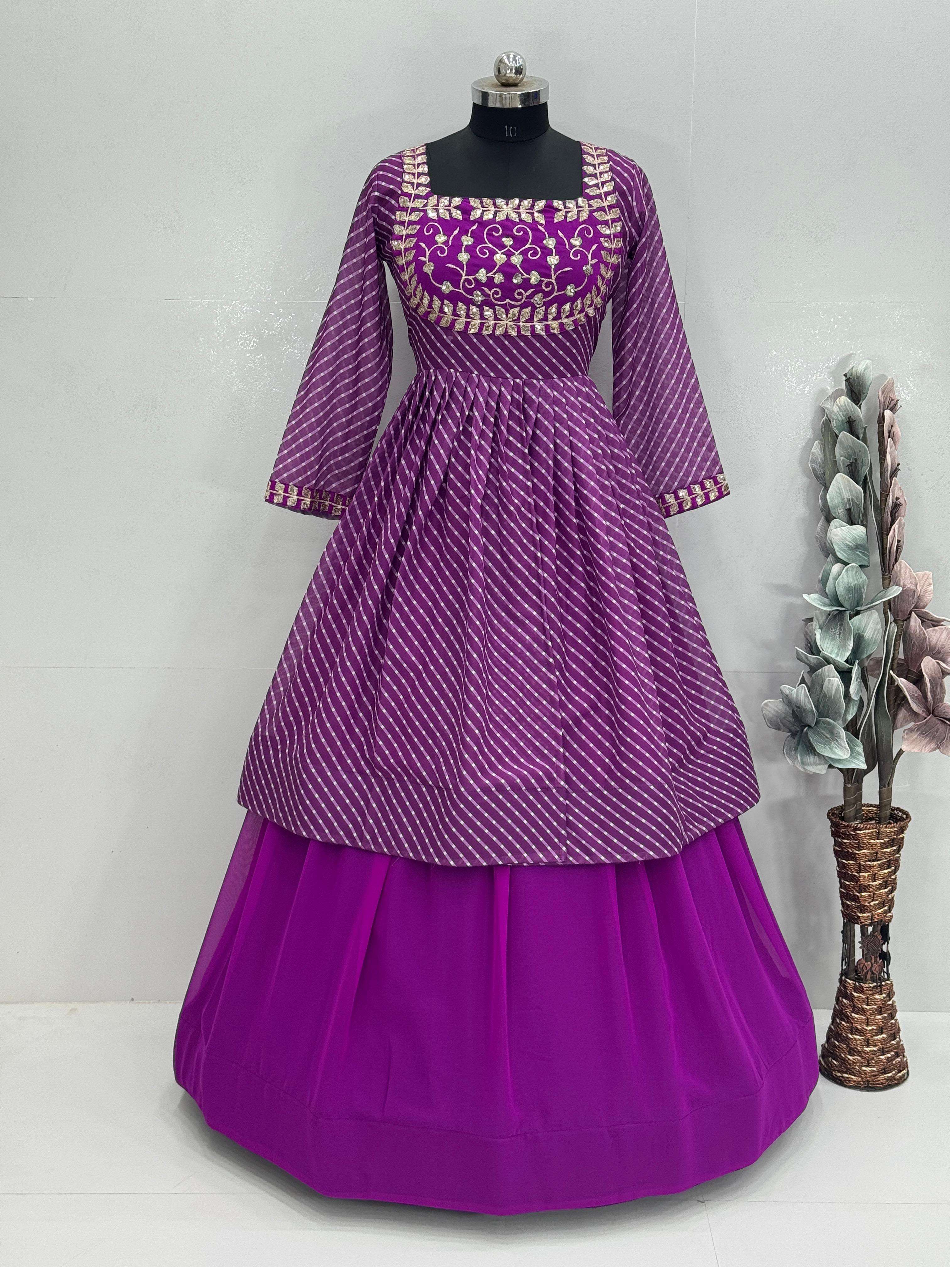 MIRROR WORK ON BEAUTIFUL FAUX GEORGETTE FABRIC LEHENGA AND LONG TOP WHOLESALE IN SURAT MT 1049