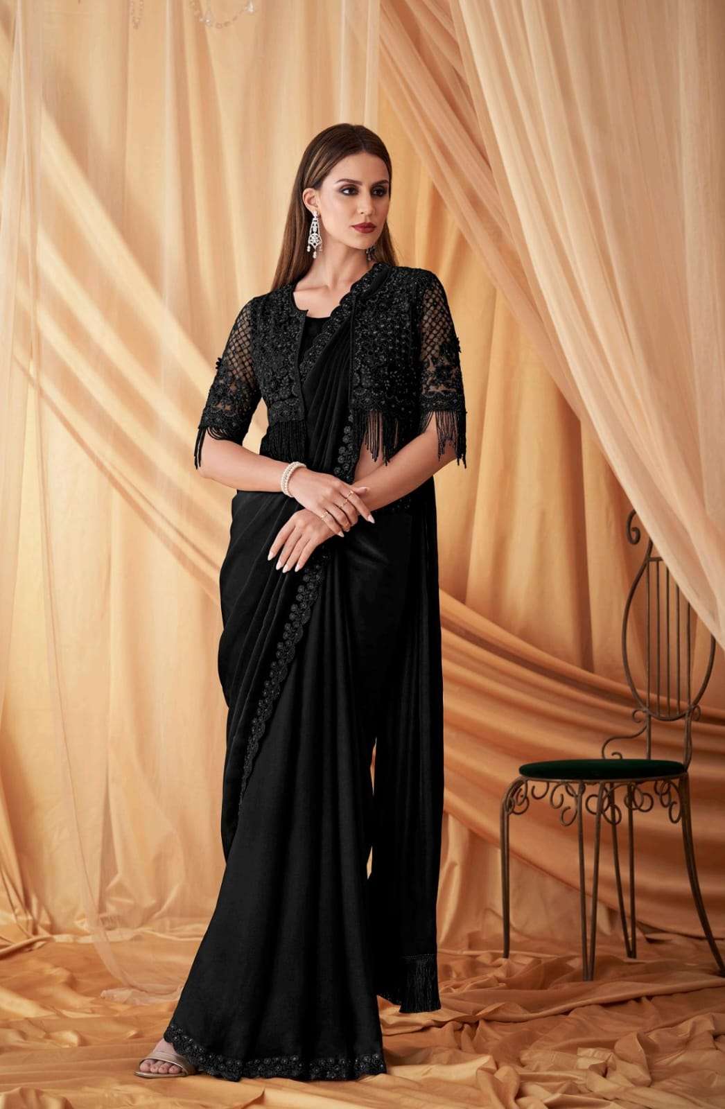 Tfh Sparkle Hits 7612 hit designer satin and georgette fabric saree wholesale in surat