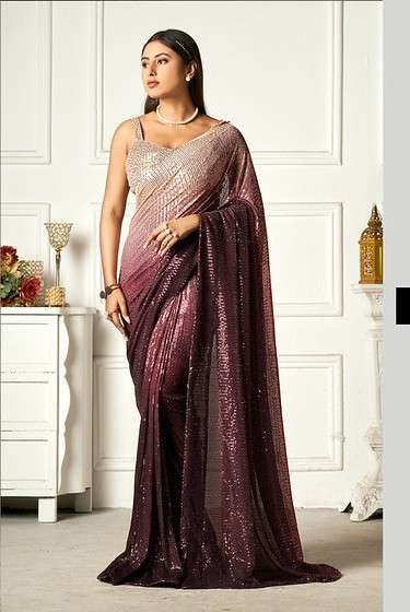 VOUCH ELITE SUPER SOFT SEQUINNED LYCRA FABRIC SAREE WHOLESALE IN SURAT  